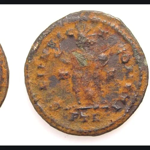 Reverso de moneda de Manes